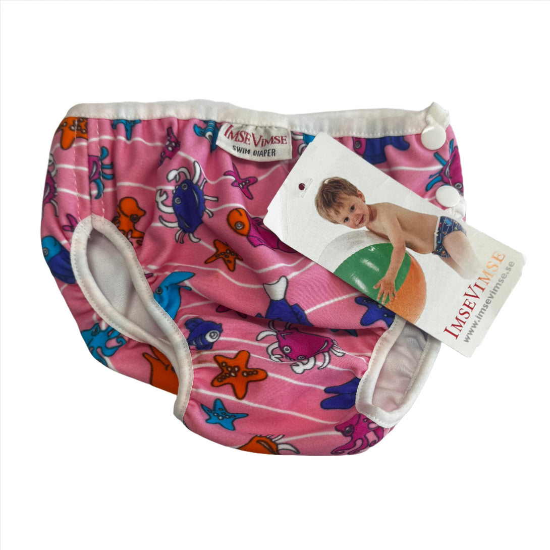 Imse Vimse Reusable Swim Nappies Imse Vimse Nappies Pink Ocean Older Style Label Placement Middle / Large (9-12kg) at Little Earth Nest Eco Shop Geelong Online Store Australia